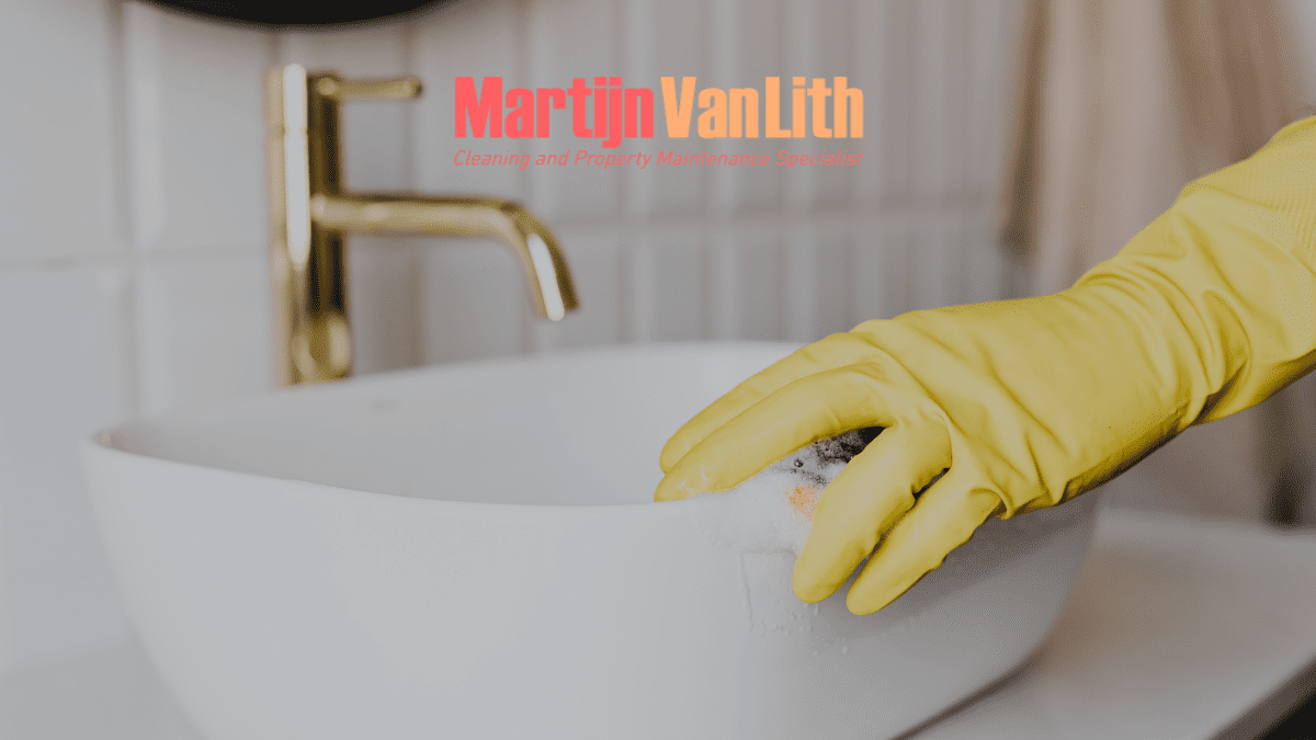 thorough cleanup gloved hand cleaning the sink
