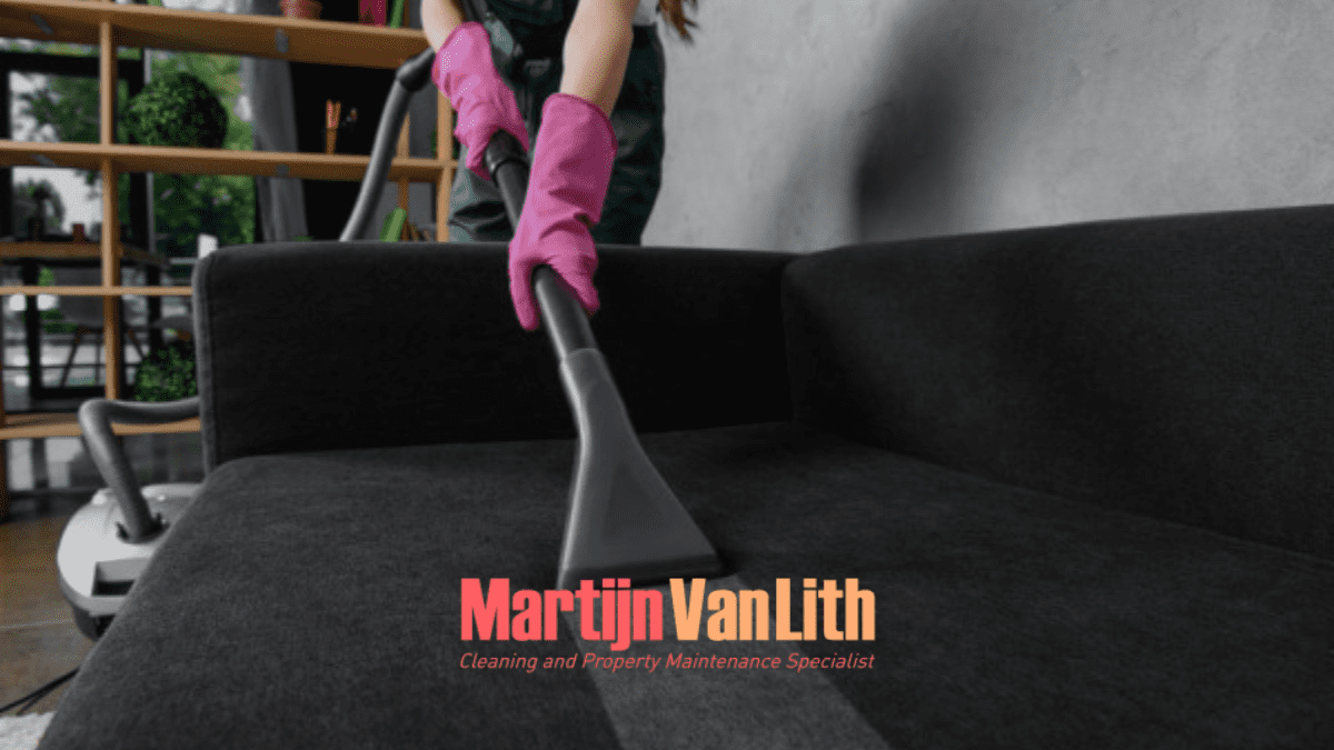 picture of hand vacuuming a sofa, end of lease cleaning